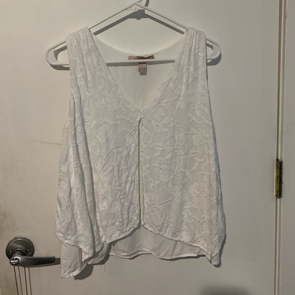 white tank top with floral embroidered overlay
